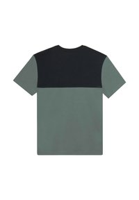 T-shirt a maniche corte con una parte superiore nera e una parte inferiore verde smorzato. Realizzato in stoffa morbida con una vestibilità rilassata.