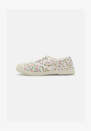 Floral canvas sneakers with white background, featuring pink and green flower patterns. Rubber sole with a rounded toe design and lace-up closure.