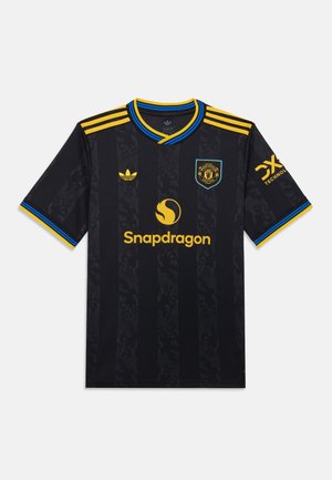 Zwart voetbalshirt met textuurstrepen, voorzien van gele accenten, ronde kraag met blauwe rand, en logo's van Adidas en Snapdragon.