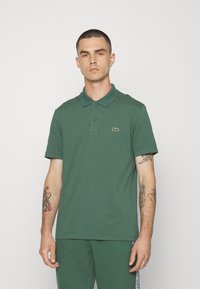 Lacoste Sport KURZARM - Polo - vert fonce