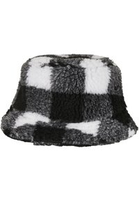 Faux fur bøttehatt i svart, hvit og grå sjakkrute mønster med en myk tekstur og bred skjerm.