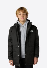Black insulated jacket featuring a zip front, snap buttons, hood, and front pockets, layered over a gray hoodie. Smooth texture.
