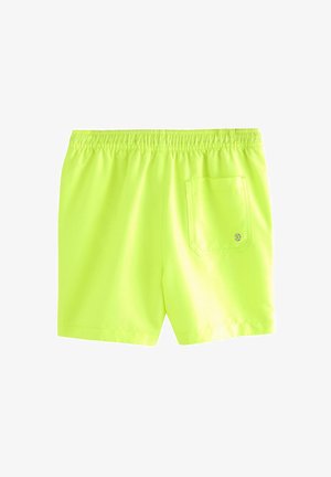 Neon žute kupaće hlače s elastičnom strukom, imaju stražnji zakrpa džep i glatku, laganu tkaninu.