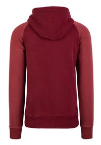 Bordeauxfarbener Hoodie mit Kordelzugkapuze, gerippten Bündchen und glatter Textur. Verfügt über Raglanärmel in einem leicht dunkleren Rotton.