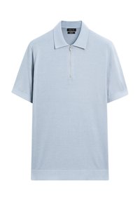 Lyseblå polo t-shirt med kort lynlås, korte ærmer og en blød tekstur. Den har en klassisk krave og en lige kant.