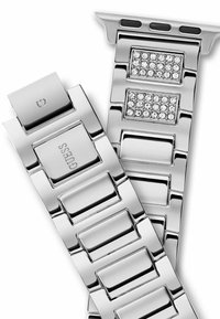 Metallist kellarihm, millel on poleeritud hõbedased lingid, ristkülikukujulised osad ja kaks osa, mis on kaunistatud kristallitriipudega.