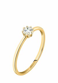 Goldfarbiger Metallring mit einem dünnen Band und einem runden, klaren Edelstein, der in einer sechszackigen Fassung eingesetzt ist. Glatte Oberfläche mit polierter Optik.