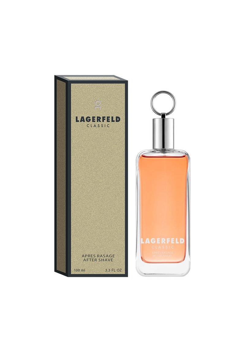LAGERFELD Classic aftershave, 100 ml, features a clear glass bottle with a silver cap and ring, containing light orange liquid. Box is gold.