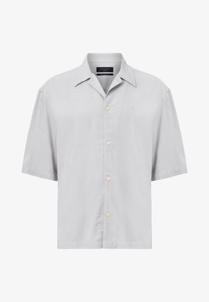 Chemise à manches courtes gris clair en tissu lisse, avec un col pointu, une fermeture à boutons et un subtil logo brodé sur la poitrine.