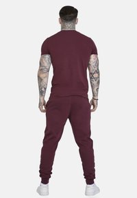 SIKSILK Pantaloni sportivi - burgundy