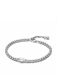 Silver beaded bracelet featuring a single white pearl, with a chain extension and clasp for adjustable fit. Smooth, reflective surface.