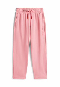 Roze sweatpants met een koord in de taille, zijzakken en het 'TOMMY HILFIGER' logo in het rood op het linkerbeen. Zacht, gestructureerd materiaal.