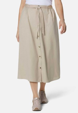 Beige, knielange rok van lichtgewicht stof, voorzien van een gestrikt tailleband, knopen aan de voorkant en een subtiele textuur. Draag met beige sneakers.