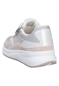 Light grey and silver sneaker with a textured mesh upper, suede accents, and a thick white sole. Features a zip closure on the side.