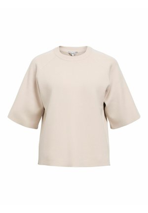 Sweatshirt court à manches courtes de couleur beige clair avec un col rond, une texture douce et des manches raglan. Présente une coupe décontractée et ample.