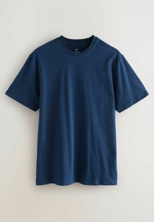 Tume sinine puuvillane T-särk lühikeste varrukatega, ümar kaelus ja sirge äär. Sile tekstuur ja klassikaline lõige igapäevaseks kandmiseks.