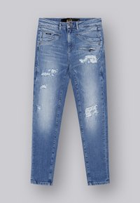 Jean en denim bleu à coupe slim, avec des zones déchirées, plusieurs poches et une fermeture éclair, comportant des détails de couture visibles.