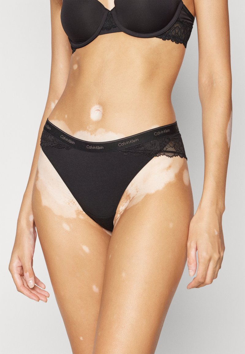 Calvin Klein Underwear TANGA ICON LACE - Nohavičky/Slipy - black