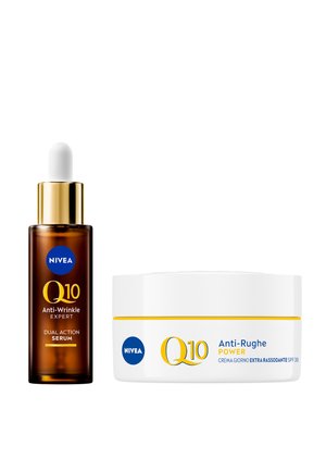 Siero anti-rughe NIVEA Q10 in una bottiglia di vetro marrone con contagocce e barattolo di crema bianca con accenti gialli, con etichette del prodotto.