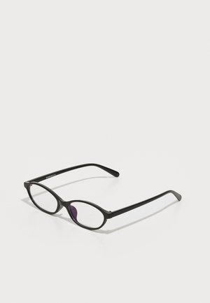 Lunettes en plastique noir avec une forme ovale, dotées de verres transparents et d'un accent violet sur le verre gauche. Design élégant et minimal.