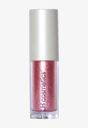 Couleur à lèvres liquide dans un tube transparent, offrant un éclat métallique en rose pâle. Le capuchon est argenté avec la marque imprimée à l'avant.