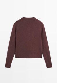 Maglione a coste borgogna con maniche lunghe, scollo rotondo e design corto. Tessuto morbido, senza loghi o fantasie visibili.