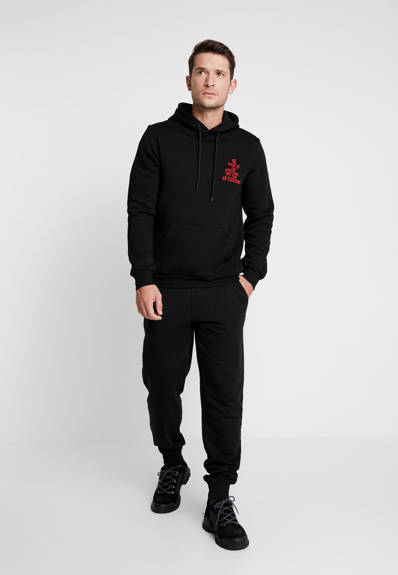 Pier One 2 PACK Tracksuit bottoms black/mottled light grey/black