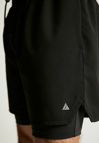 Next 2-IN-1 TRAINING - Shorts - black