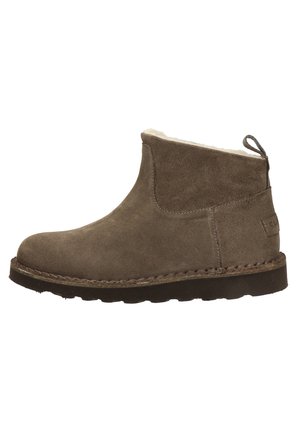 Brown suede ankle boot with a soft inner lining, round toe, and a textured rubber sole. Features a rear pull tab and contrast stitching.
