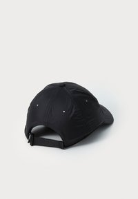 Black cap made of lightweight material with a curved visor, six-panel design, and adjustable strap at the back. Features ventilation holes.