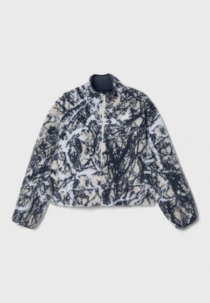 Fleecejacke mit hohem Kragen, ausgestattet mit einem marmorierten Muster in Schwarz, Weiß und Creme. Inklusive Frontreißverschluss und elastischen Bündchen.