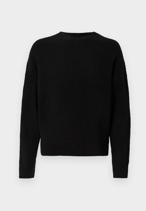 Pulover negru din tricot cu guler rotund, mâneci lungi și textură cu nervuri. Design simplist, material gros și croi ușor lejer.