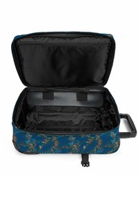 Valigia con un motivo astratto di foglie blu e arancioni. Contiene un interno nero con una tasca con zip e cinghie regolabili per il contenuto.