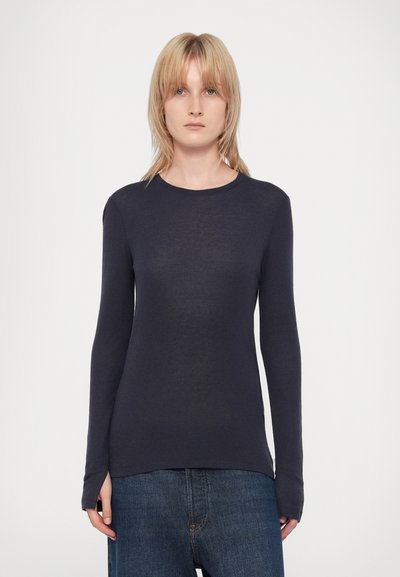 Dark navy long-sleeve shirt made from lightweight fabric with a round neckline, slim fit, and side slits at the hem.