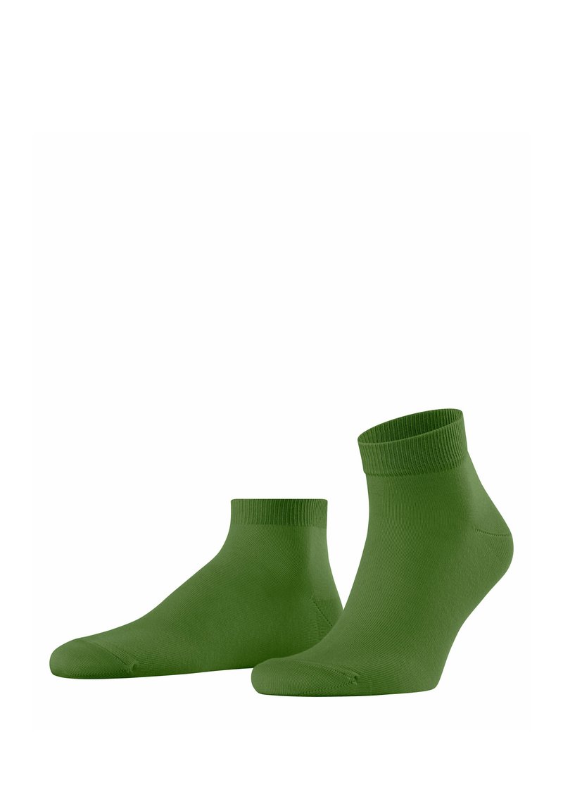 Calzini alla caviglia verdi realizzati in un materiale morbido, con punta senza cuciture e polsino a costine per il massimo comfort. Design semplice e uniforme, senza motivi.