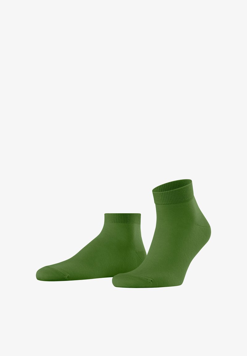 Calzini alla caviglia verdi realizzati in un materiale morbido, con punta senza cuciture e polsino a costine per il massimo comfort. Design semplice e uniforme, senza motivi.