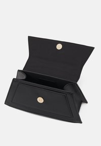 Black leather wallet with a gold snap closure, featuring an interior compartment and a smooth texture. Rectangular shape, minimalist design.