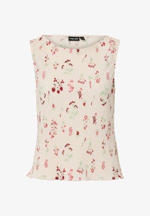 Blusa senza maniche color avorio con scollo rotondo che presenta piccole stampe floreali e di bacche rosse e rosa distribuite sul tessuto.