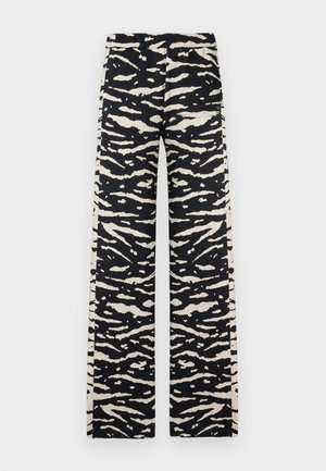 Sort og cremefarvet zebrastribede bukser med vidde i benene og elastisk linning, med lommer og en glat, let stoftekstur.