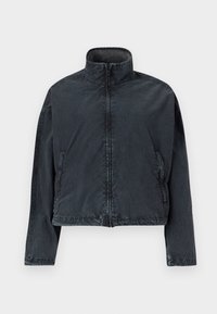 Black cropped jacket made of soft, smooth material, featuring a high collar, front zipper, and side pockets with subtle stitching details.