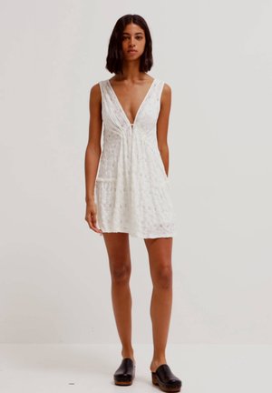 WITH SWISS EMBROIDERY AND RUFFLES - Day dress - beige