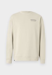 Φωτεινό μπεζ φούτερ από απαλό υλικό με στρογγυλή λαιμόκοψη, μακριά μανίκια και το λογότυπο "PENFIELD" στο στήθος.