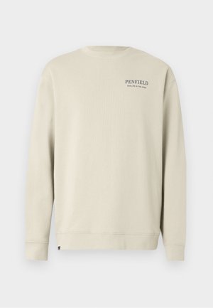 Hele beežist pehmest materjalist dressipluus, millel on ümmargune kaelus, pikad varrukad ja rinnal "PENFIELD" logo.