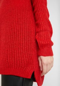 QS Striktrøje - red