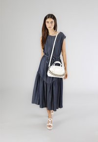 CAFèNOIR Funda para cámara - white