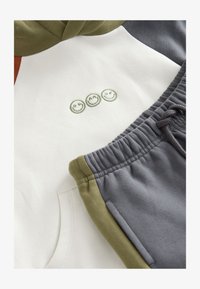 Unselected, ecru/off white and charcoal grey colourblock