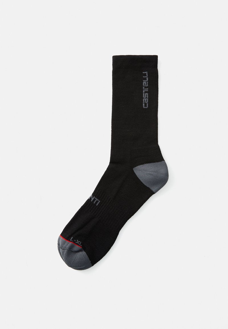 Calcetín deportivo negro con punta y talón grises. Presenta una textura acanalada y un logo impreso en gris. Tamaño L-XL indicado en la punta.
