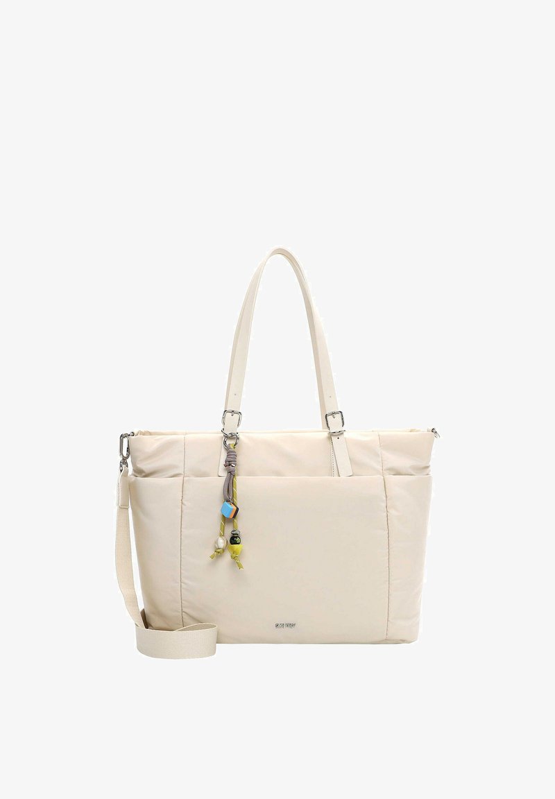 Cream tote bag with long handles, adjustable shoulder strap, front pocket, and colorful bead keychain accessory.