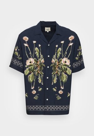 Navy short-sleeve button-up shirt with symmetrical floral design and geometric border patterns on sleeves and hem.