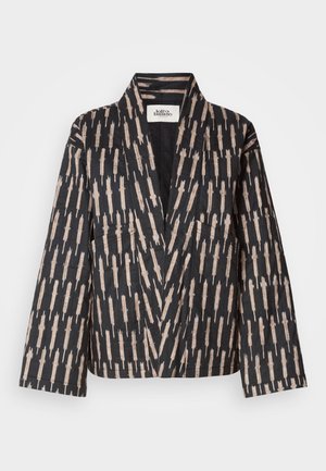 Zwart stoffen blazer met een geometrisch beige patroon, gestructureerde kraag en twee voorzakken, gemaakt van een gestructureerd materiaal.